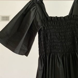 Lisa Says Gah Black dress